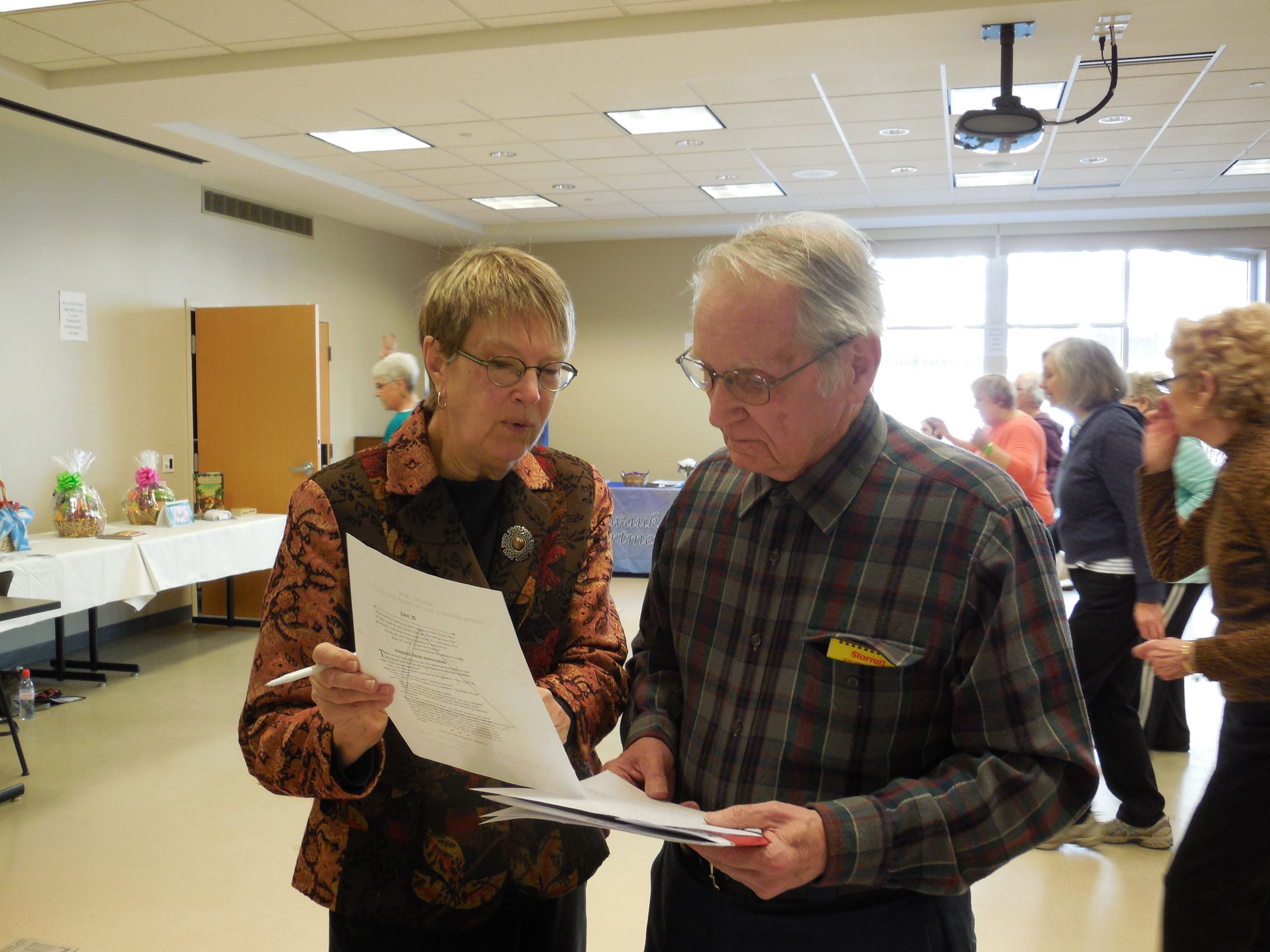 Judy Spencer shows John Bullock memory screening results